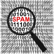 stock-photo-computer-security-concept-present-by-magnifying-glass-focus-on-the-red-spam-text-in-binary-code-114574033