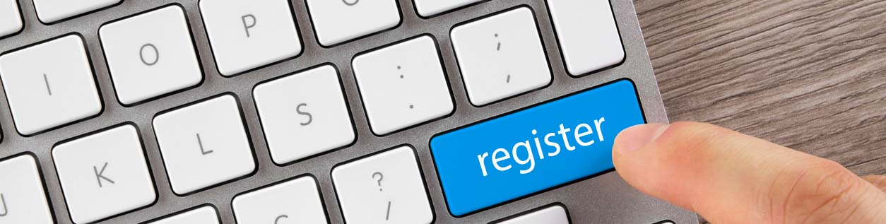 Image of key board with key saying 'register'.